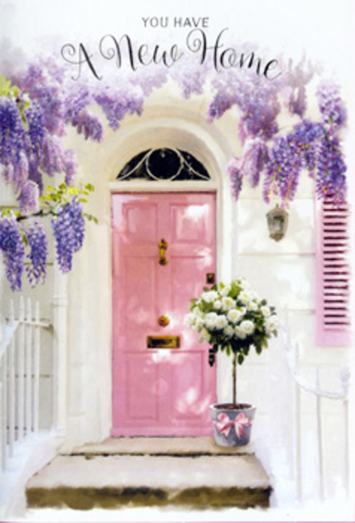 This image reveals a deeply inviting entrance that could belong to a refurbished terrace near Shepherd's Bush Green, transformed into a celebration of new beginnings through flowers and soft colour. The front door is painted in a tender shade of blush pink, with a smooth, even finish that glows gently in the available light, suggesting a bright but slightly filtered day. Around it, the wall is whitewashed, its subtle texture catching tiny shadows from the greenery and floral canopy above. That canopy is formed by generous clusters of lavender wisteria, hanging down in lengths that sway visually from the unseen branches overhead. Each wisteria cluster is made up of many tiny blossoms, creating a rich, tumbling curtain of purple that frames the door in a romantic arc. Resting on the doorstep is a grey metal bucket, classic and slightly rustic, overflowing with white and cream roses. The blooms are immaculate and full, the petals plush and curled at the edges, overlapping to create layers of soft, creamy texture. Interspersed among the roses are sprigs of light, airy foliage in muted green tones, giving the arrangement height and a natural, garden-grown feel. Around the bucket's base, a pink satin ribbon is tied, the exact hue echoing the door so that eye is drawn naturally from bouquet to threshold. The ribbon's loose ends drape softly over the stone, adding a final note of sweetness. The mood is calm yet full of anticipation, as if these flowers have been arranged to welcome someone returning from signing papers on Uxbridge Road, turning an ordinary doorway into a symbolic gateway to their new life and the everyday moments that will soon fill it.